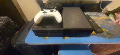 Xbox one 500 GB and hacked. with 2 joystick s. 0