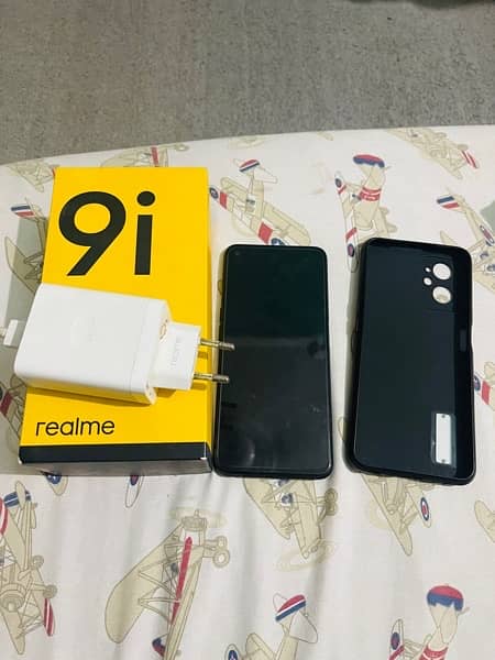 Realme 9i with box and original charger + back cover 10