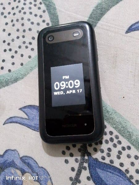 nokia 2660 flip ok condition new model just box he sath 8