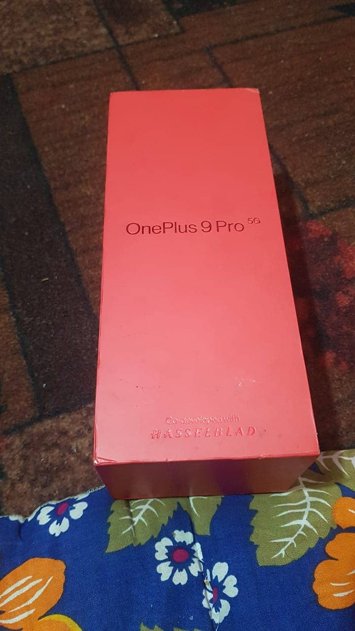 Oneplus 9 pro with box and charger 2
