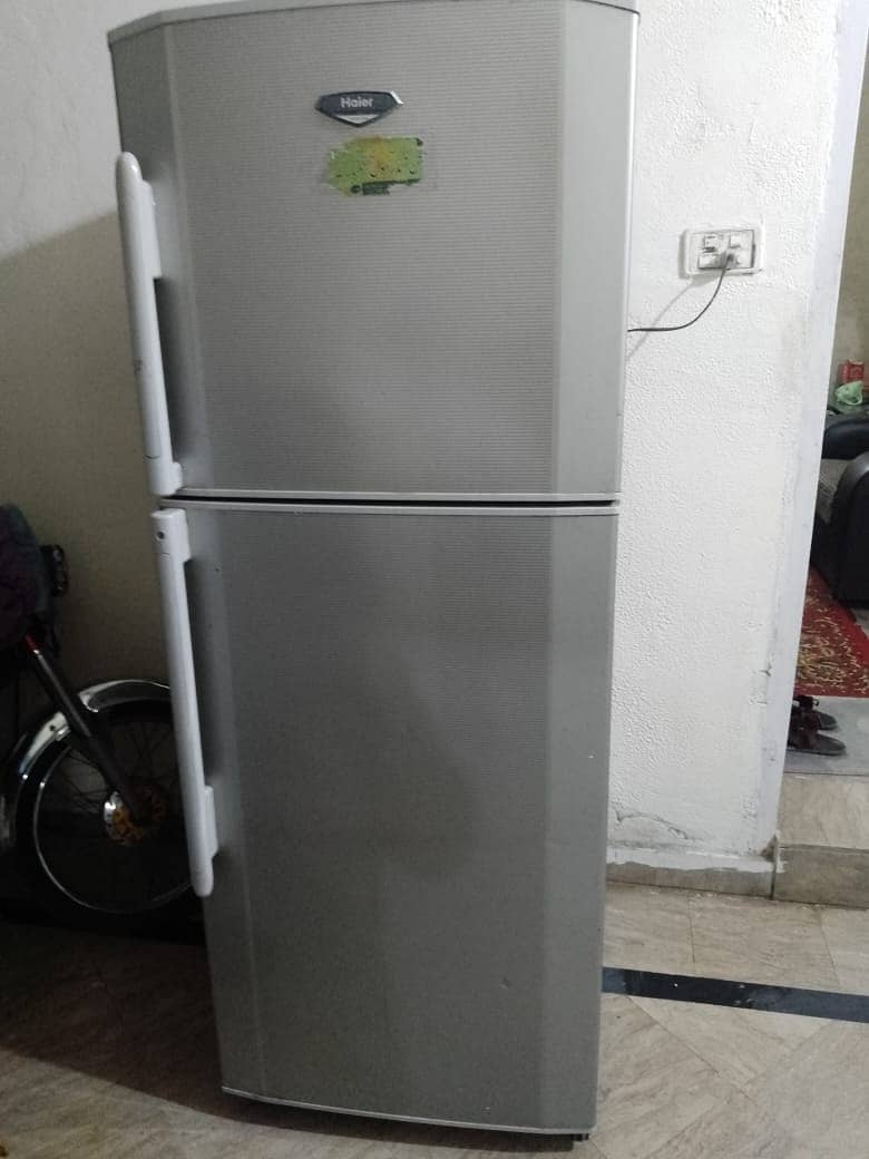 I am selling my Haier large size refrigerator 4