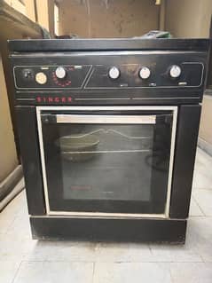 Singer cooking rage oven for sale. 0