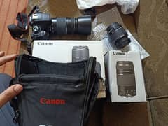 canon 1300D. camera.  2 lens