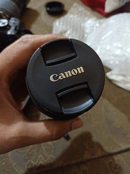 canon 1300D. camera.  2 lens 5