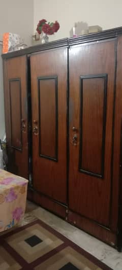 Three door wooden wardrobe
