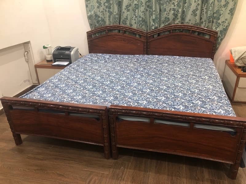 pair of single beds with mattresses solid wood 0