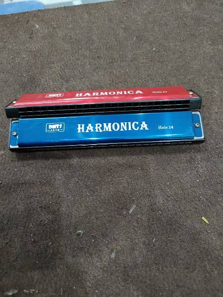 Harmonica / mouth organ  24 wholes 7