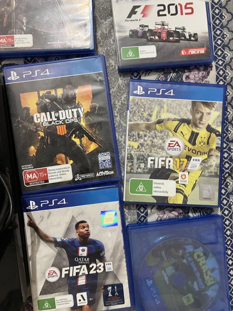 PS4 with controller and all Games (Australian Version) 5