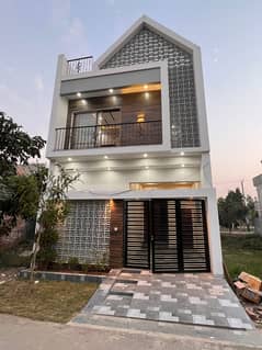 4 marla brand new house is available for sale in hafeez garden housing scheme phase 2 canal road near jallo park opposite sozo water park lahore.