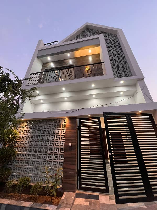 4 marla brand new house is available for sale in hafeez garden housing scheme phase 2 canal road near jallo park opposite sozo water park lahore. 24