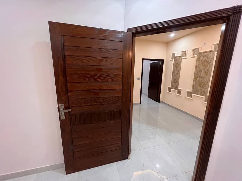 4 marla brand new house is available for sale in hafeez garden housing scheme phase 2 canal road near jallo park opposite sozo water park lahore. 27