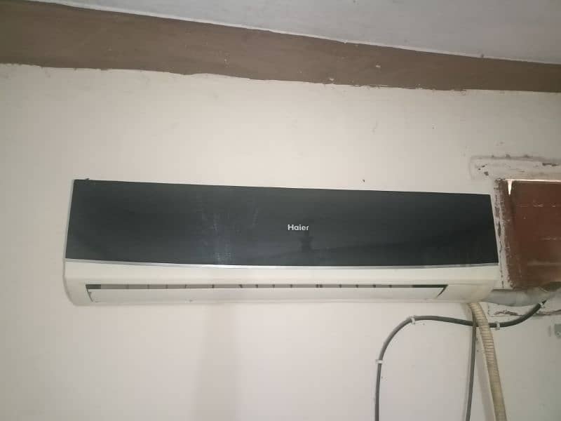 Haier 1.5 ton split Ac (2014 model) with outer and original remote. 1