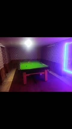 snooker table 5 by 10 used in a good condition with beljum snoker ball