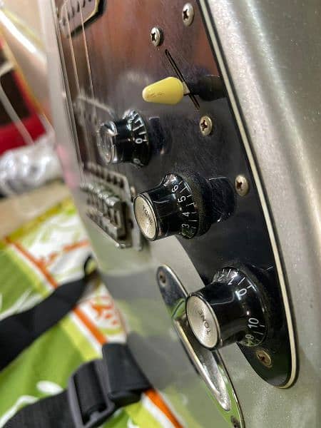 Urgent selling Silver Electronic Guitar 2