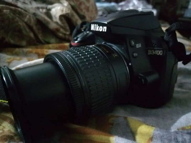 Nikon D3400 with 18-55 Lens (charger and bag) 6