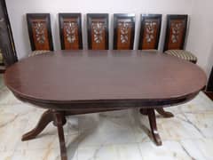 Solid Wooden Dining Table With 6 wooden chairs set.