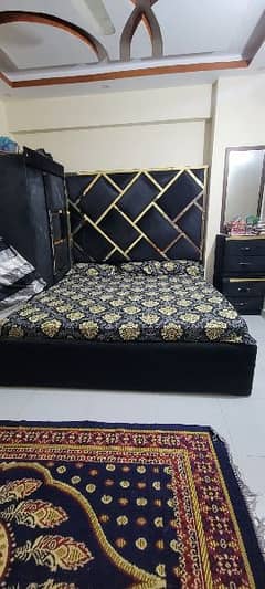 bed and almari with 2 side tables