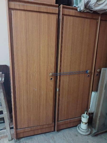 Wooden 3 door Almari and divider available for sale. . 3