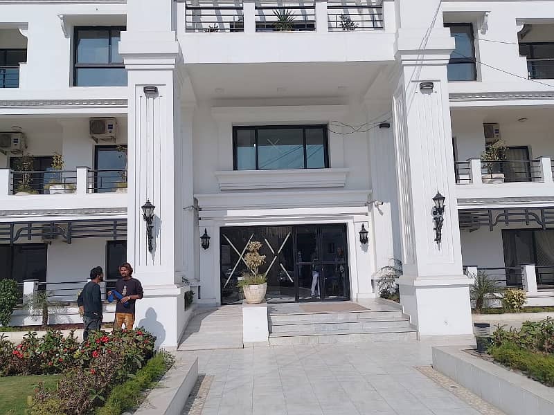 In "The springs apartment homes" an affordable Flat available on rent on Main Canal Bank Road,near izmir town,lahore 8