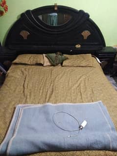 wooden bed set very solid and very good condition.