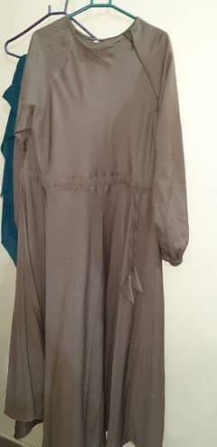 abaya good condition zip ok  light brown color  length 54 0