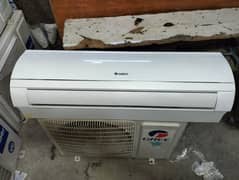 GREE ONE TON USED INVERTR HEAT AND COOL R410 GASS 0