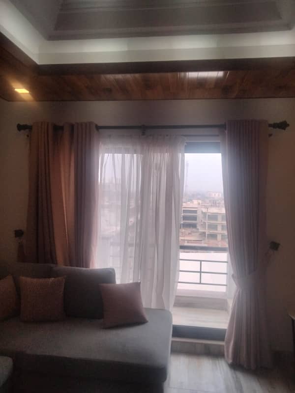 SEMI FURNISHED, ONE BED APARTMENT IN A TRUE RESIDENTIONAL FAMILY BUILDING IN JUST RS-10900000/- 1