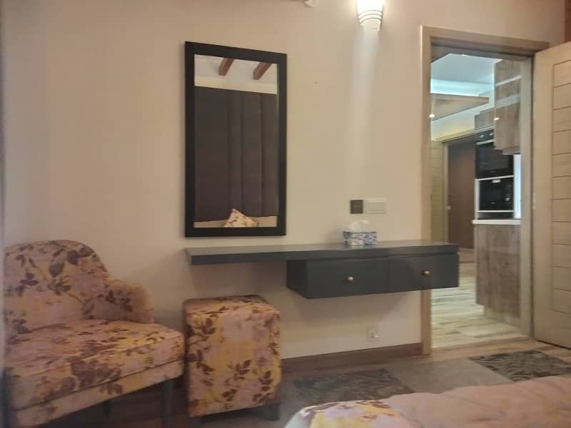 SEMI FURNISHED, ONE BED APARTMENT IN A TRUE RESIDENTIONAL FAMILY BUILDING IN JUST RS-10900000/- 14