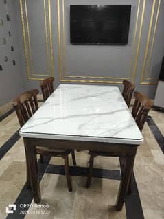 5 × 3 feet dining table with 4 chairs 0
