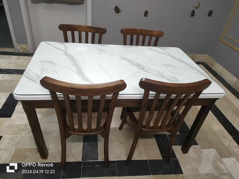 5 × 3 feet dining table with 4 chairs 1