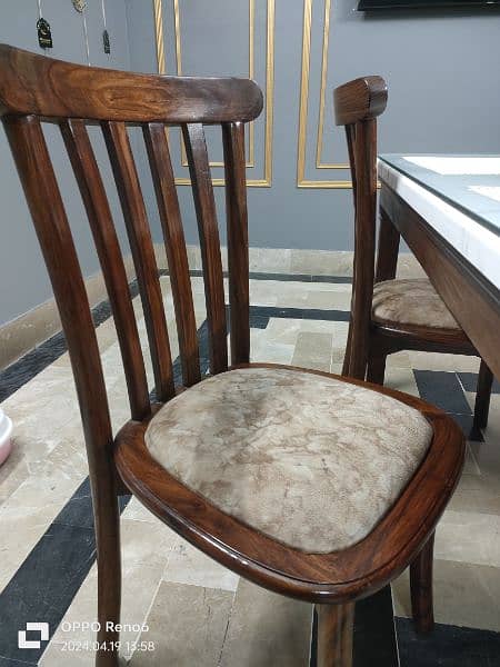 5 × 3 feet dining table with 4 chairs 10