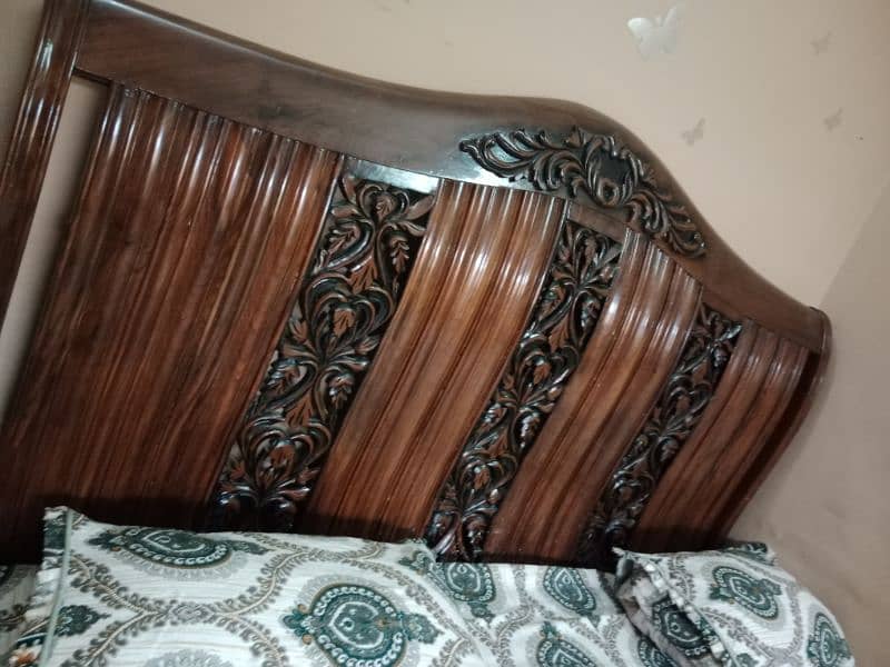 king size beautiful bed with side table 1