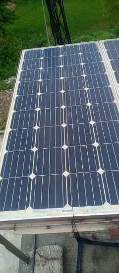 2 solar panels and 1 stand