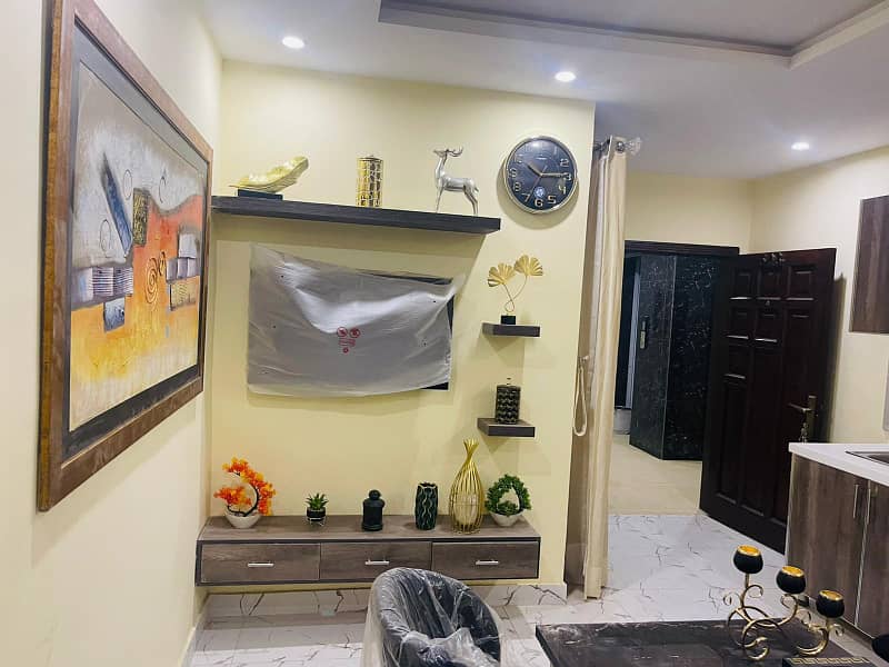 1 BEDROOM FULLY FURNISHED APARTMENT FOR SALE IN SECTOR D BAHRIA TOWN LAHORE 6
