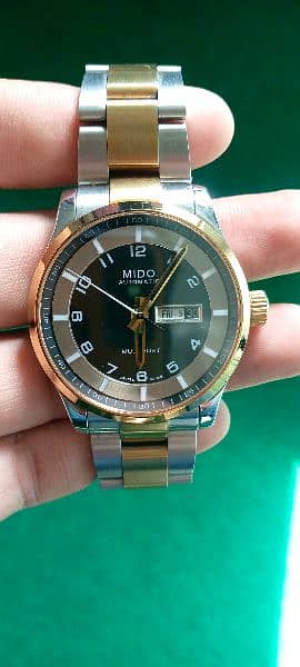 Swiss Watches Famous name all over Pakistan Mido tow tone Automatic 0