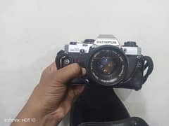 olympus om 10 camera with 50mm 1.8 lens include