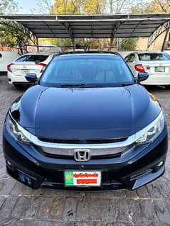 first owner home used honda civic oriel top variant UG