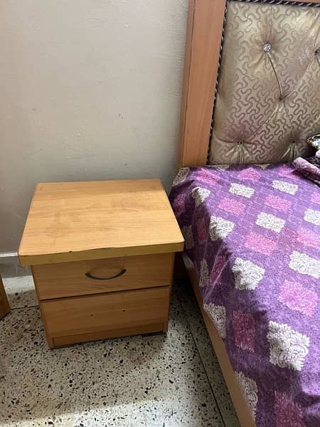 single bed with one side table with matterss 1