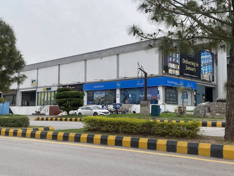 Best Possession able main Boulevard Shop with famous brand operational as Tenant . Best Investment safe, secure , Bahria Transferable and possession able opportunity 14