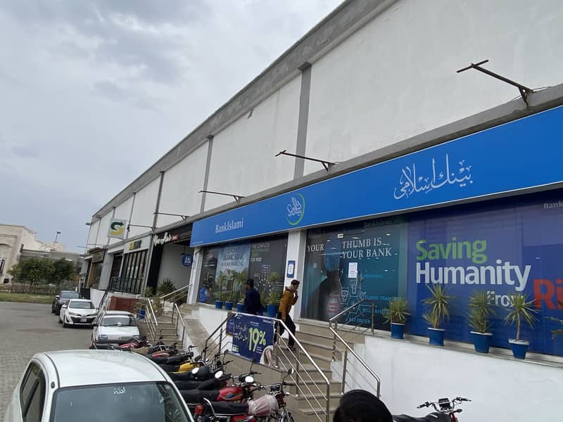 Best Possession able main Boulevard Shop with famous brand operational as Tenant . Best Investment safe, secure , Bahria Transferable and possession able opportunity 15
