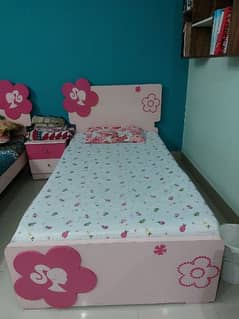 2 single beds set with a dressing