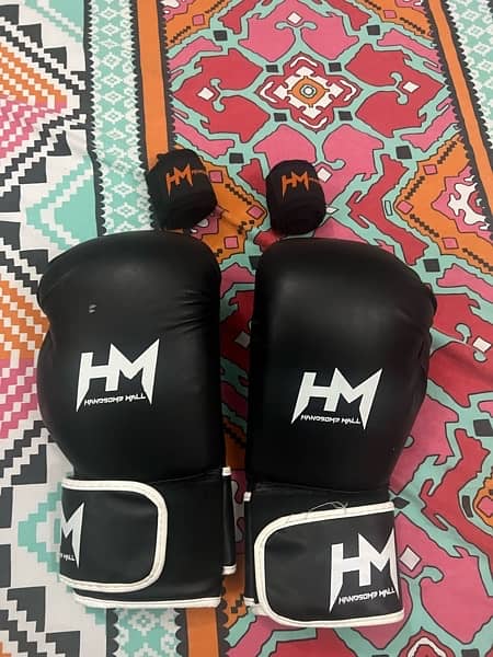 boxing bag with gloves and hand wraps 1