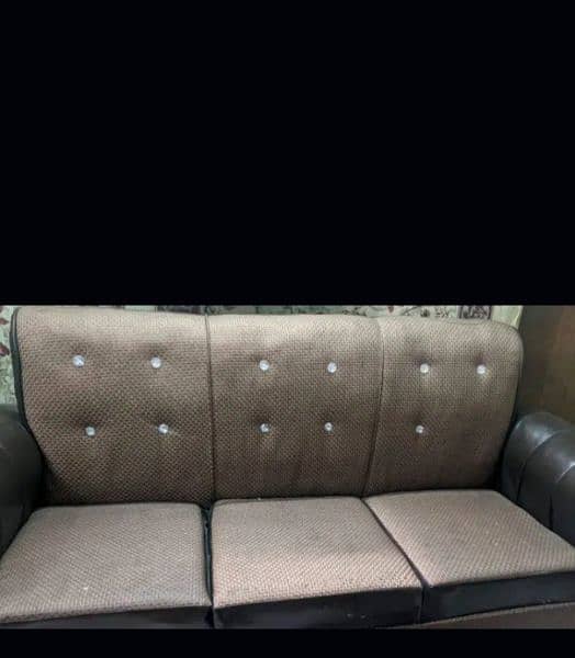 sofa in good condition solid wood 1