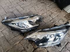 Nissan Not Head lights 100% Genuine available