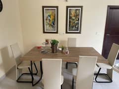 Dining table habitt with 6 chairs good condition