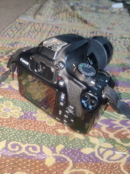 Canon 1200D with charger battery and 2 lenses urgent 0