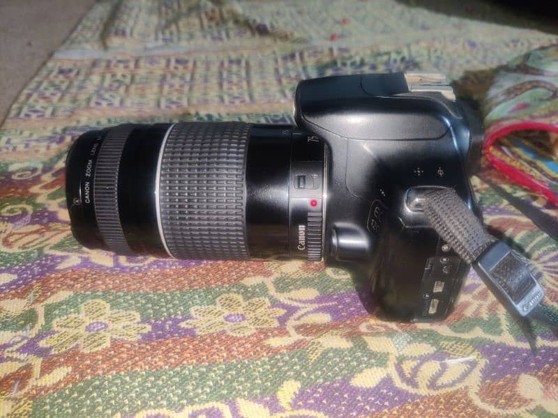 Canon 1200D with charger battery and 2 lenses urgent 1