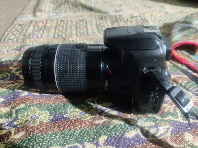 Canon 1200D with charger battery and 2 lenses urgent 2