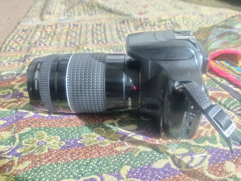 Canon 1200D with charger battery and 2 lenses urgent 3