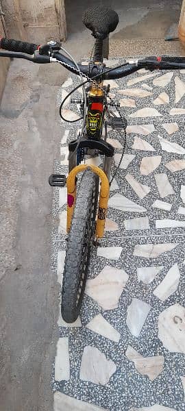 geared bycycle urgent for sale condition used their is just on paddel 2